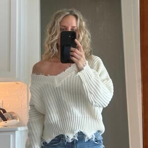 Main Strip off the shoulder distressed sweater